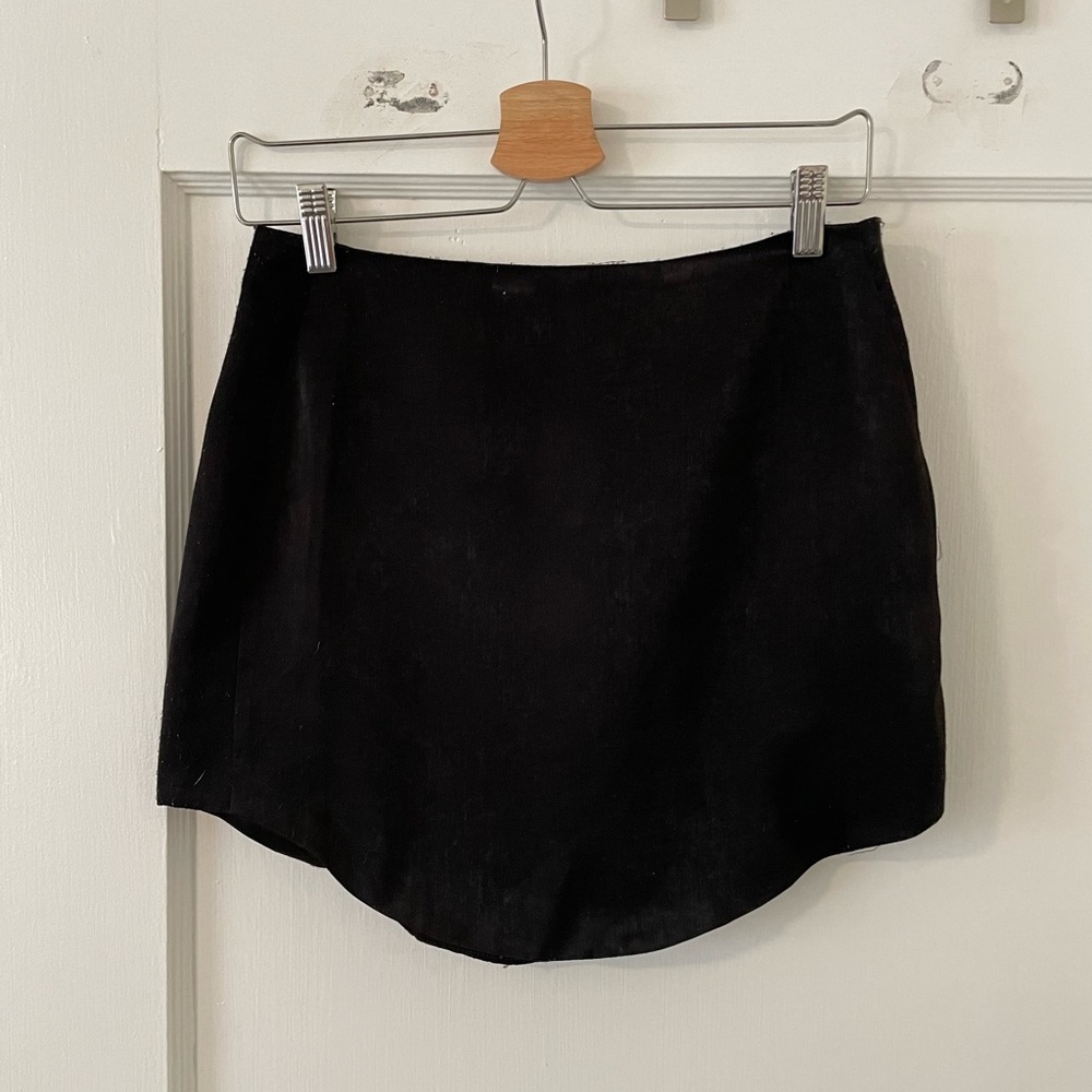 Cute black mini skirt. Very soft, silk-like material